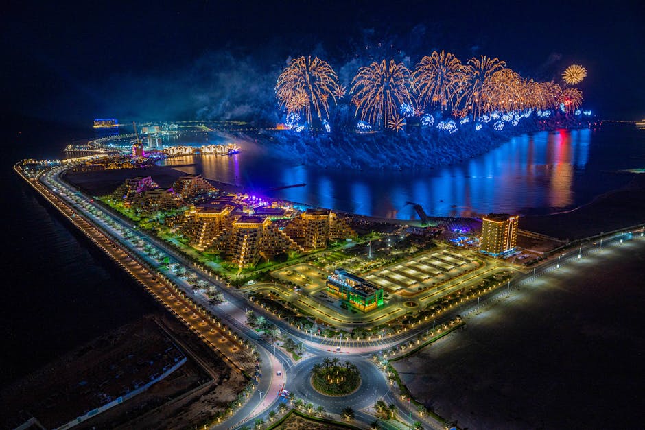 services-01 Breathtaking aerial view of fireworks over Ras al Khaimah coastline at night.